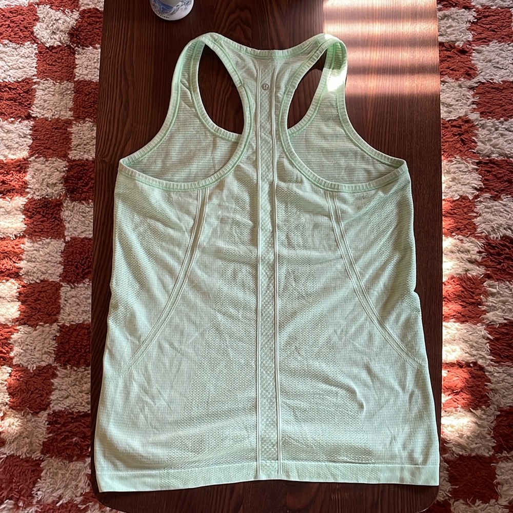 Mint green lululemon swiftly tank in excellent condition